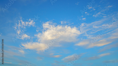 White clouds on the blue sky.