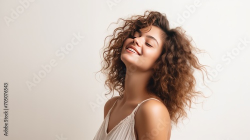 Happy cheerful girl smiles gently side view take a photo in studio white background. AI generated photo