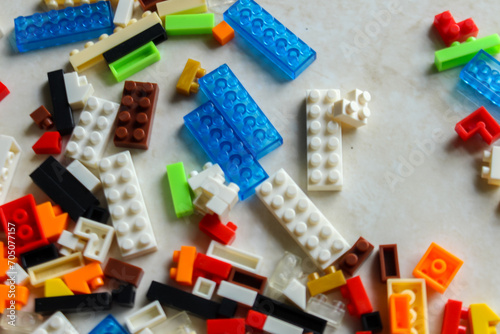 pile of colorful Lego blocks. Top angle view of lego bricks on white background photo