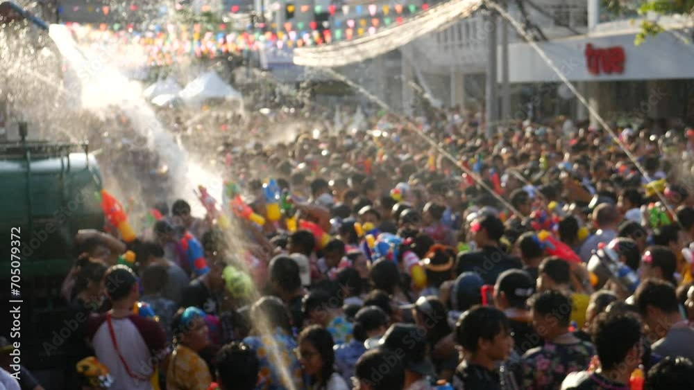 Songkran in Thailand, Traditional Thai New Year Festival. Songkran is inscribed as the UNESCO’s Intangible Cultural Heritage event for Humanity from Thailand. People play water and use water guns.