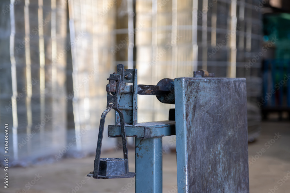 weighing Scale in front of tin used to fill olive oil and all type of oils weighing Scale in front of tin used to fill olive oil and all type of oils