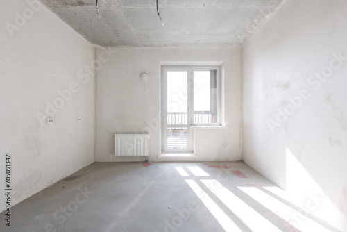 interior of the apartment without decoration in gray colors. rough finish