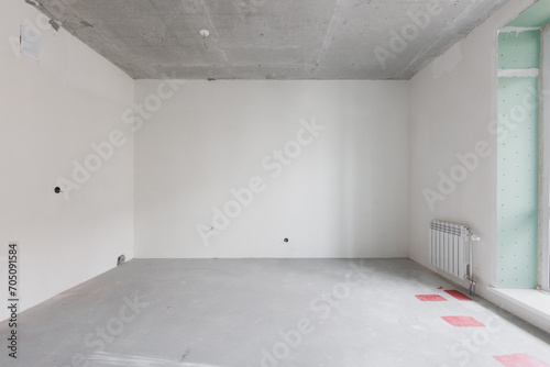 interior of the apartment without decoration in gray colors. rough finish