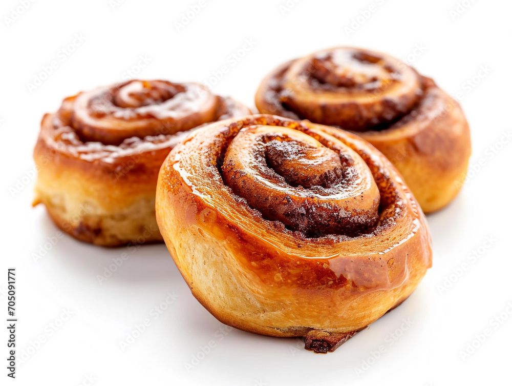 Delicious cinnamon rolls isolated on a white background. Minimalist style. Delicious cinnamon rolls isolated on a white background. Minimalist style.