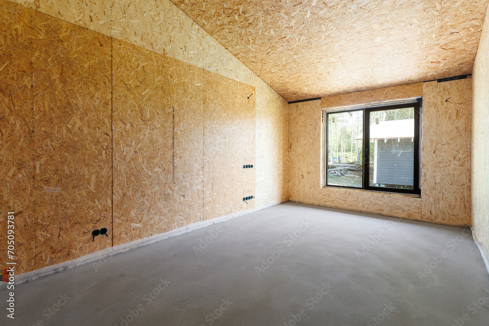 Fototapeta premium interior of the apartment without decoration in gray colors. rough finish