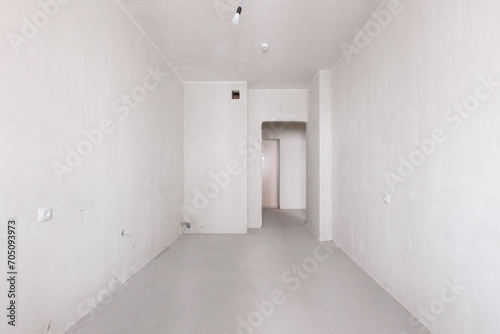 interior of the apartment without decoration in gray colors. rough finish