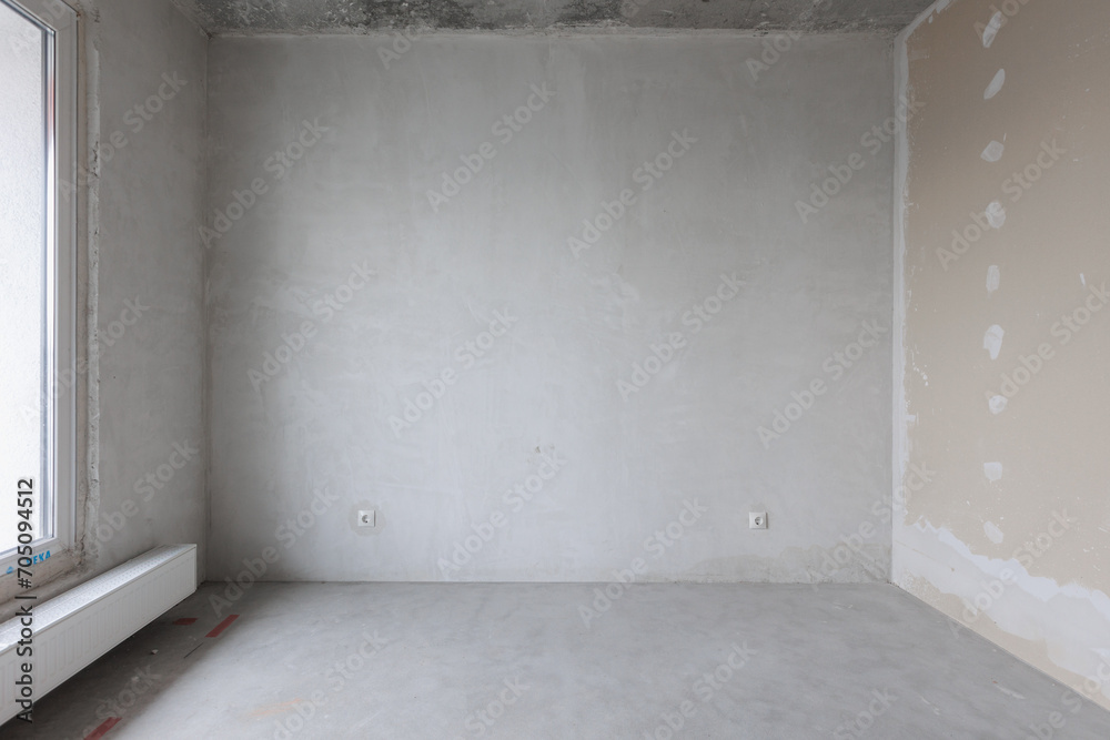 interior of the apartment without decoration in gray colors. rough finish interior of the apartment without decoration in gray colors. rough finish