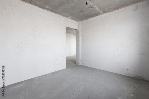 interior of the apartment without decoration in gray colors. rough finish