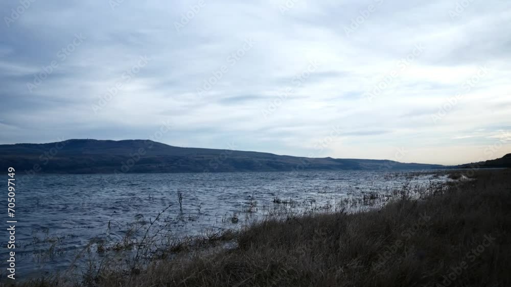 morning panorama of a lake surrounded by hills morning panorama of a lake surrounded by hills