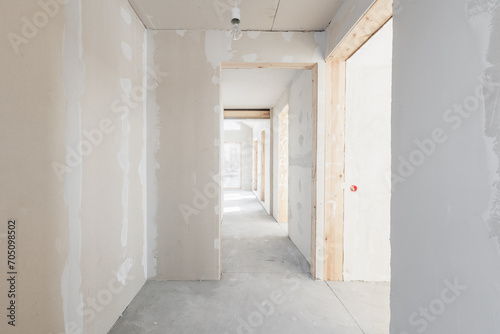 interior of the apartment without decoration in gray colors. rough finish