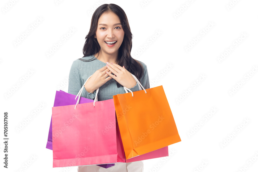 Portrait excited beautiful asian woman holding shopping bags isolated on white background and copy space Surprise happy asian lady open mouth with excited Beauty young female love shopping Portrait excited beautiful asian woman holding shopping bags isolated on white background and copy space Surprise happy asian lady open mouth with excited Beauty young female love shopping