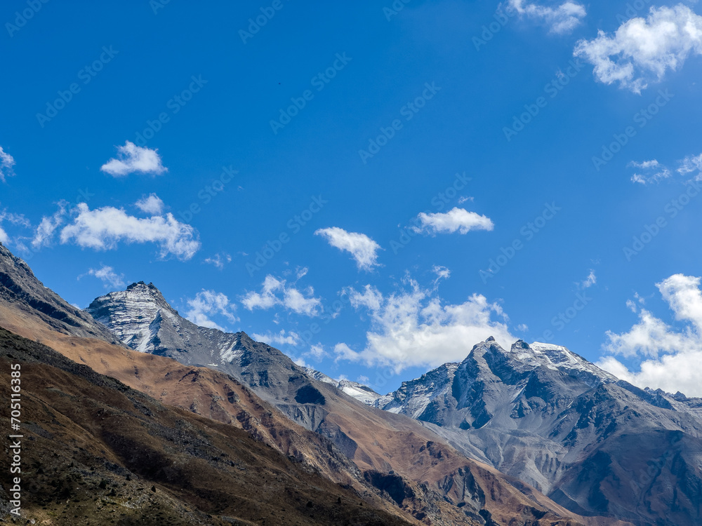 Landscape in the mountains with blue sky and clouds on a bright day