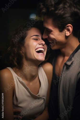 Young couple hugging, sharing tender moments, radiating happiness and love in home studio.