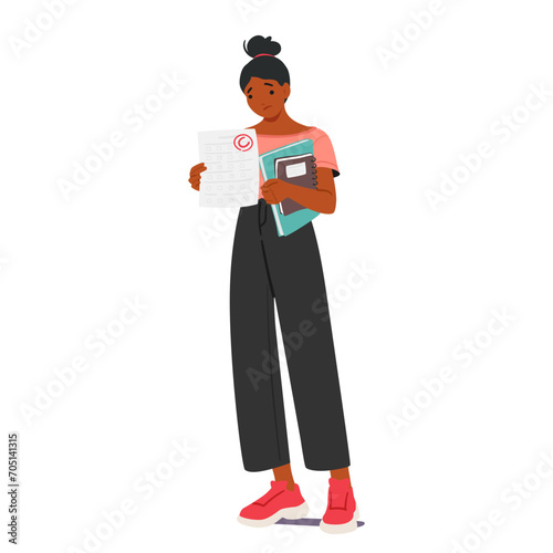 Disappointed Student Girl Holds Up Her C Test Result, Her Expression Revealing A Mix Of Frustration And Determination