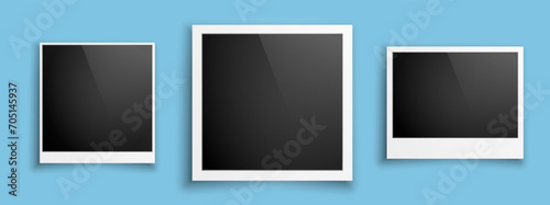 A set of three retro photo frames on a blue background. Vintage paper photos for a keepsake album. Decorative banners for websites. Vector format EPS 10. photo