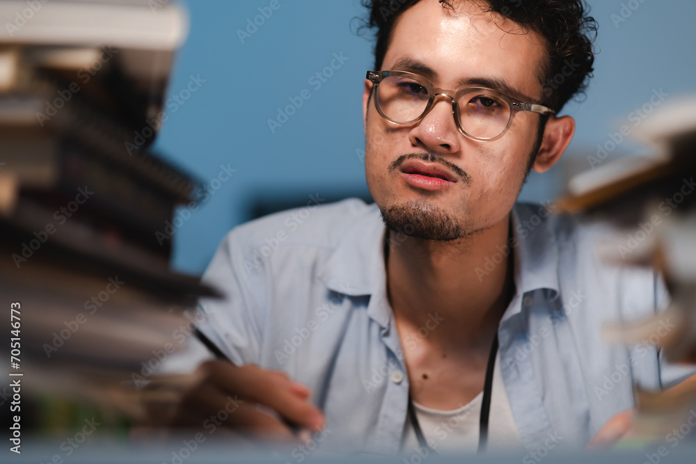 Stressed, tired and frustrated business man with headache at night from burnout or making mistake on laptop. Overworked creative entrepreneur failing to meet late office deadline or working overtime Stressed, tired and frustrated business man with headache at night from burnout or making mistake on laptop. Overworked creative entrepreneur failing to meet late office deadline or working overtime