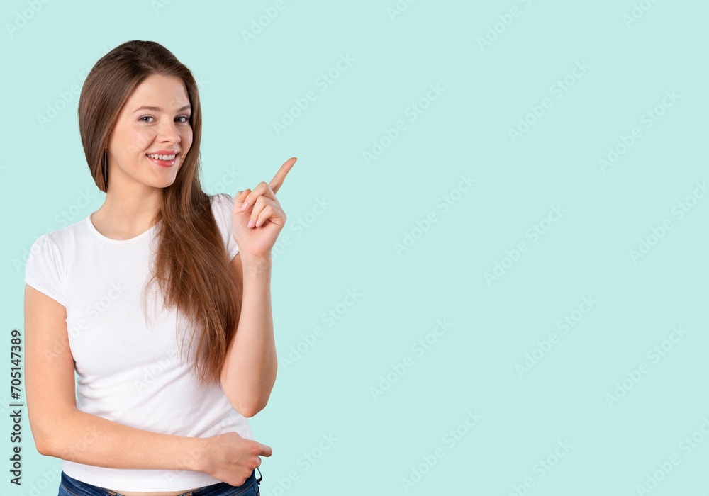 pretty young woman standing pointing finger pretty young woman standing pointing finger