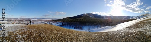 Panorama of mountains in winter, mountain ranges, winter landscape. photo