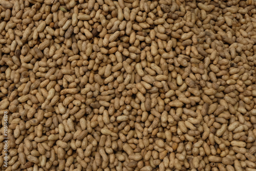 A stack of raw peanuts or groundnuts. A stack of raw peanuts or groundnuts.