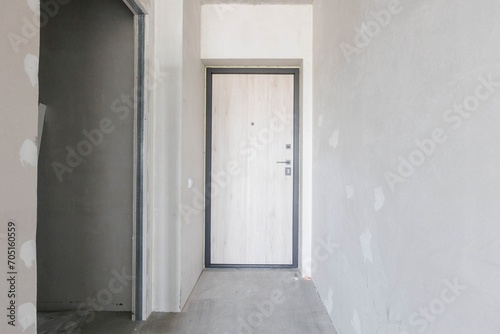 interior of the apartment without decoration in gray colors. rough finish