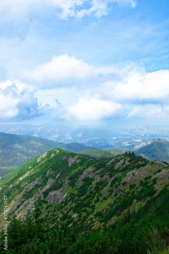 Mountain panorama of the Tatra Mountains from Kasprowy Wierch (Kasper Peak) on a summer day in Poland