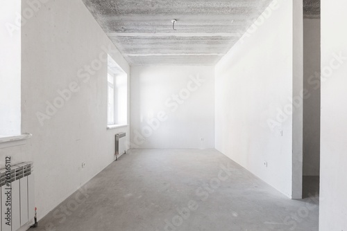 interior of the apartment without decoration in gray colors. rough finish