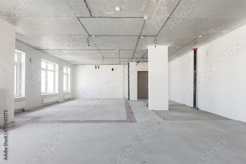 interior of the apartment without decoration in gray colors. rough finish