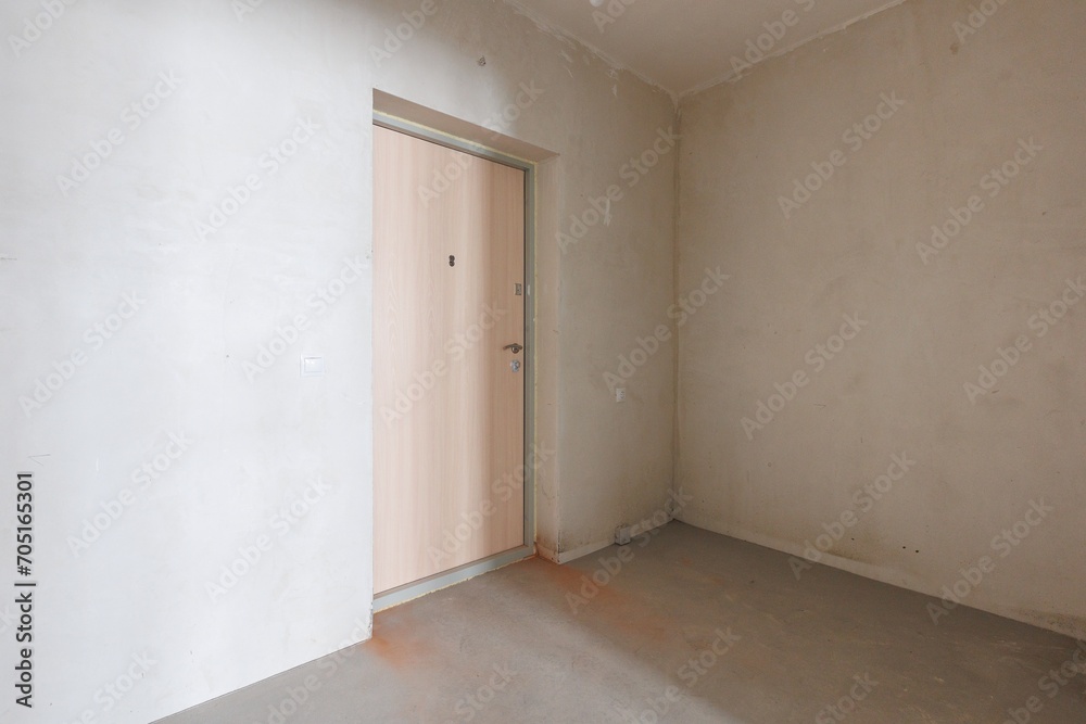 interior of the apartment without decoration in gray colors. rough finish interior of the apartment without decoration in gray colors. rough finish