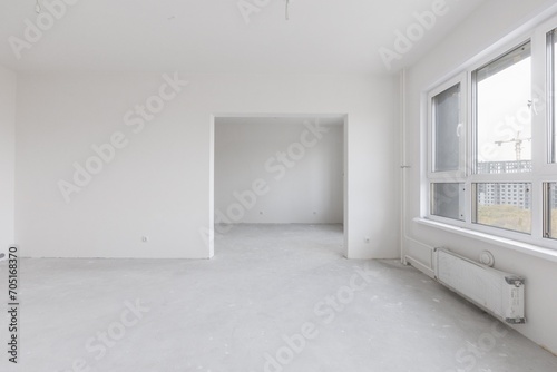 interior of the apartment without decoration in gray colors. rough finish