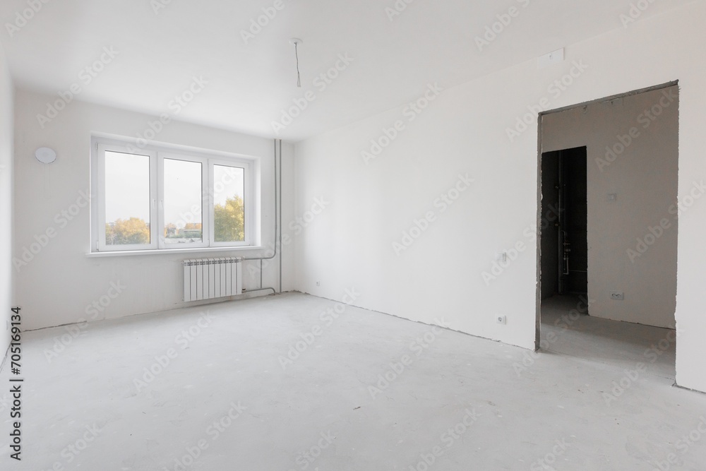 interior of the apartment without decoration in gray colors. rough finish interior of the apartment without decoration in gray colors. rough finish