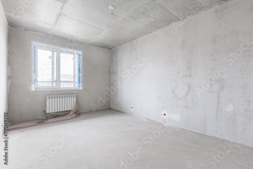 Wallpaper Mural interior of the apartment without decoration in gray colors. rough finish Torontodigital.ca