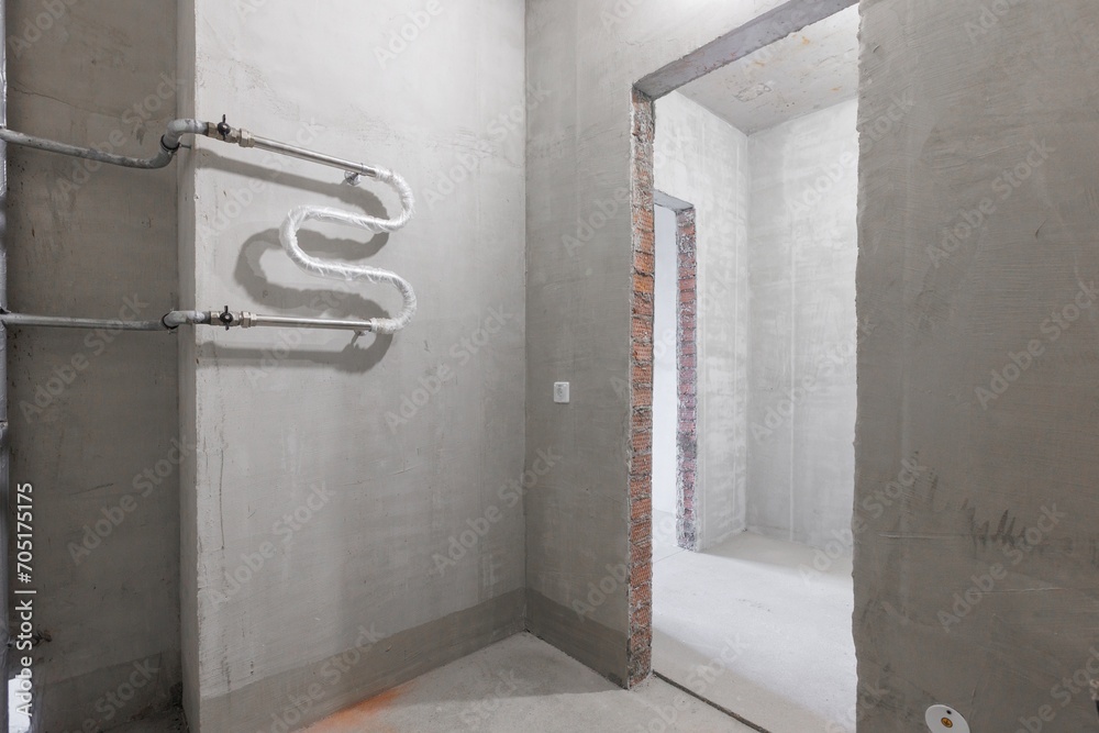 interior of the apartment without decoration in gray colors. rough finish interior of the apartment without decoration in gray colors. rough finish