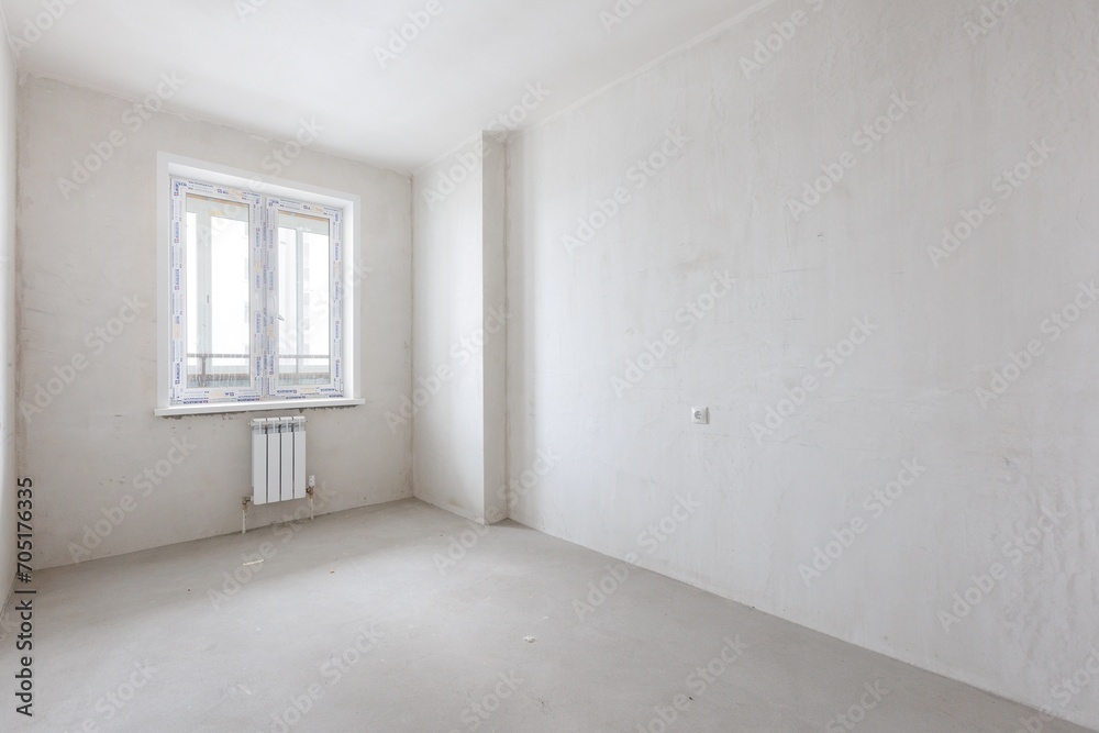 interior of the apartment without decoration in gray colors. rough finish interior of the apartment without decoration in gray colors. rough finish