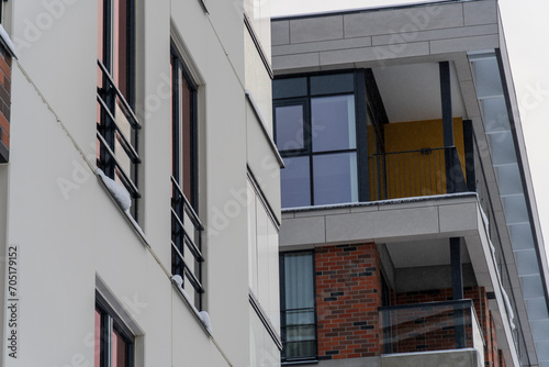 Looking up to modern new apartments building at Pille street during winter time. Tallinn, Estonia, Europe. December 2023