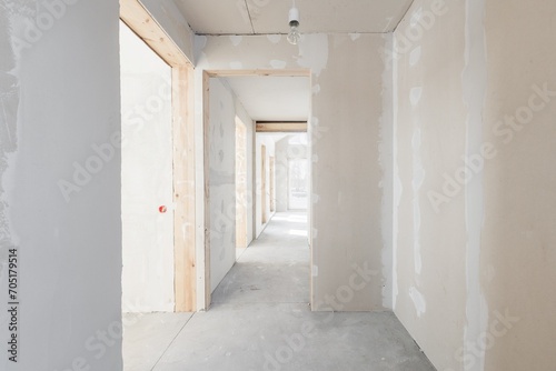 interior of the apartment without decoration in gray colors. rough finish