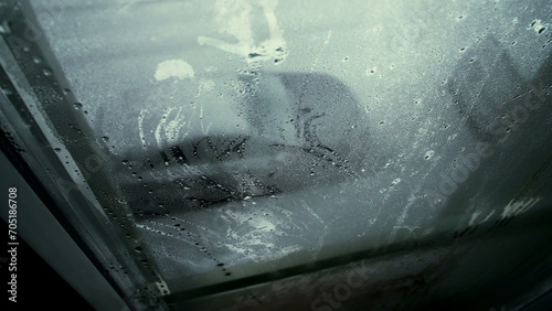 Winter Window Gaze, Melancholic View of a Homebound Person © Marco