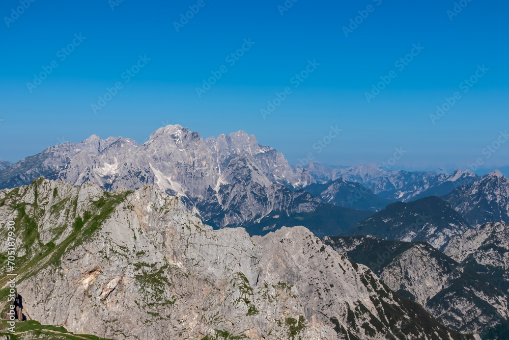 Scenic view from Mangart Saddle (Mangartsko sedlo) on Jof Fuart and Jof di Montasio in untamed Julian Alps, Friuli Venezia Giulia, Italy, Europe. Hiking wanderlust in alpine wilderness in Italian Alps