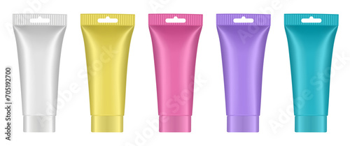 Purple, blue, pink, yellow and white tubes with hanging holes. Rainbow palette of acrylic paint in plastic tubes. Liquid watercolor. Oil paint or gouache. Tempera. Hand cream, mask or lotion.