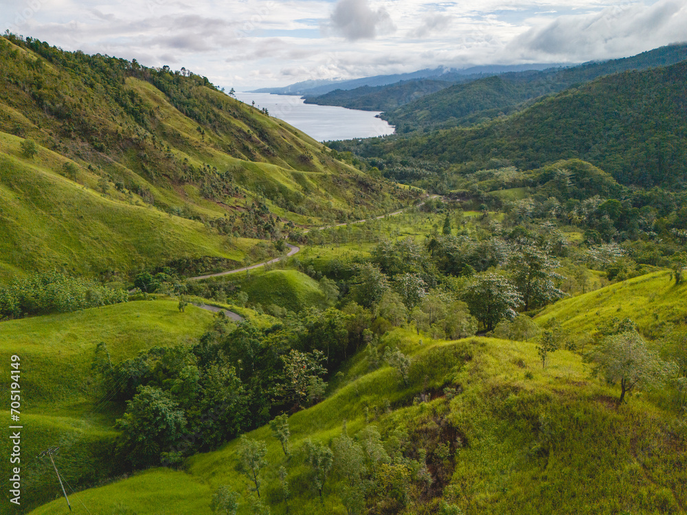 Beautiful Green Grass Hill in West Seram Regency, Maluku, Indonesia