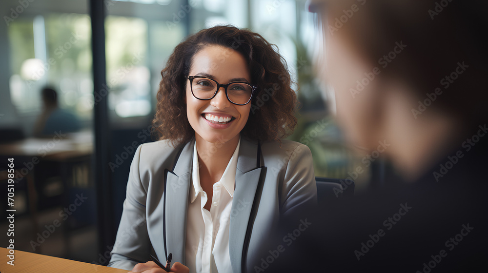 American Female Office Worker in Suit and Glasses Applying for Job Interview - Business Meeting American Female Office Worker in Suit and Glasses Applying for Job Interview - Business Meeting