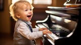 essence of a two-year-old boy playing the piano with delight in a music school. early exploration of musical talent and the joy of early education.