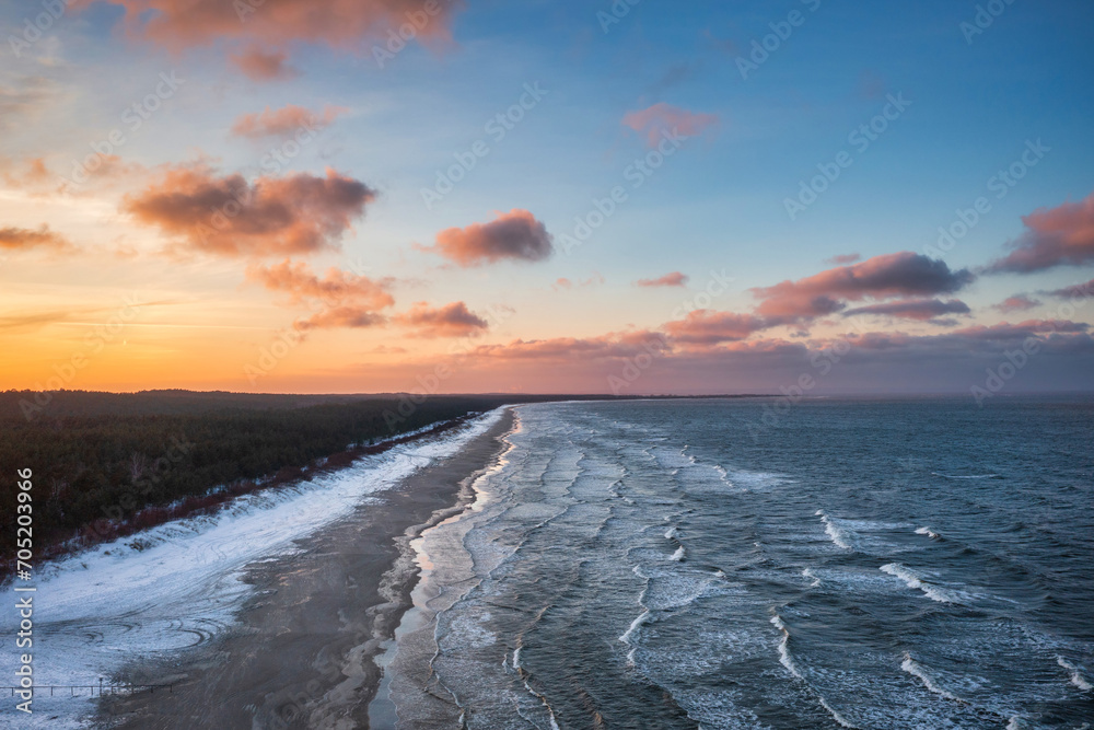 Winter sunset over the Baltic Sea in Jantar, Poland