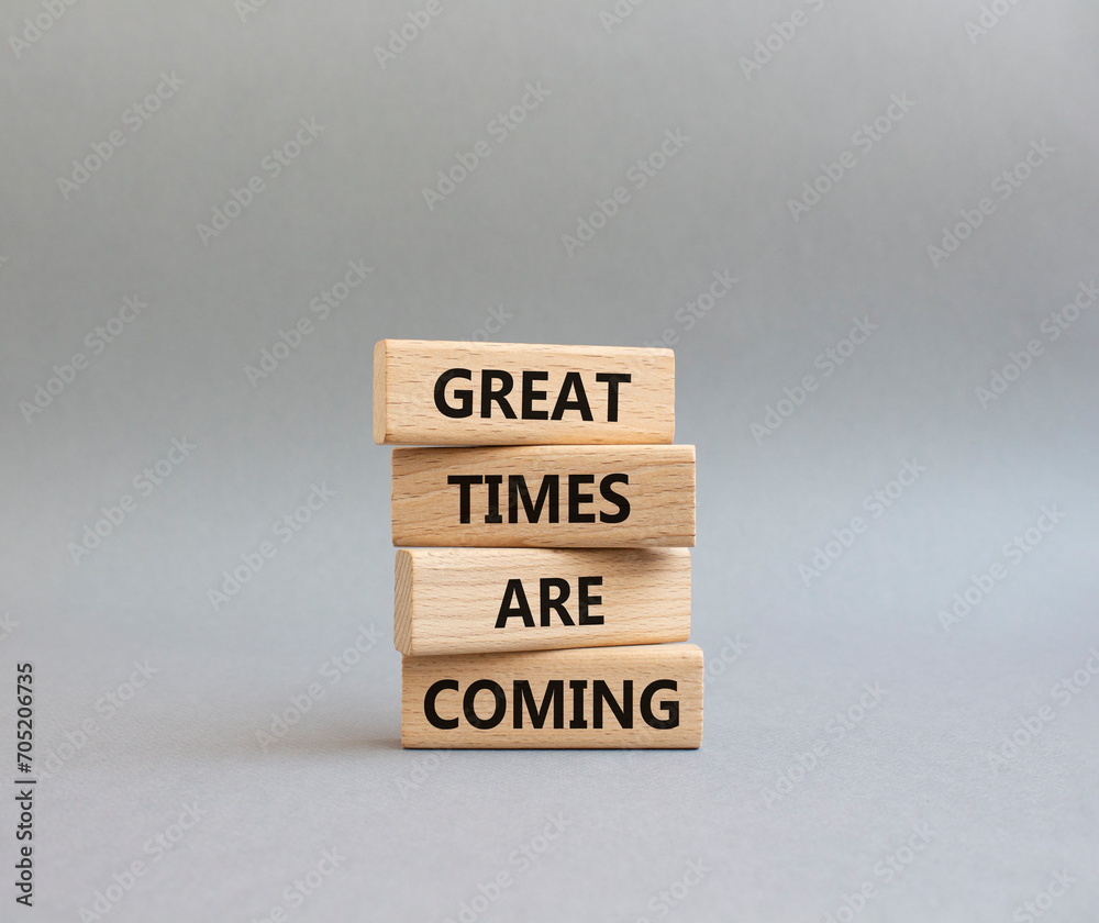Great times are coming symbol. Concept words Great times are coming on wooden blocks. Beautiful grey background. Business and Great times are coming concept. Copy space. Great times are coming symbol. Concept words Great times are coming on wooden blocks. Beautiful grey background. Business and Great times are coming concept. Copy space.