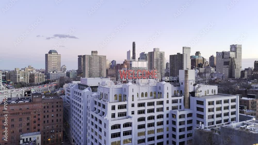 Brooklyn Heights, New York - HDR drone shot rising up past “Welcome” sign for high angle aerial view towards downtown Brooklyn Brooklyn Heights, New York - HDR drone shot rising up past “Welcome” sign for high angle aerial view towards downtown Brooklyn