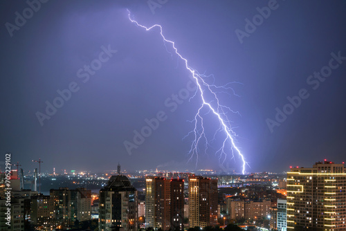 Lightning in the night sky over the city.