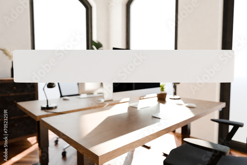 transparent text box in front of modern minimalistic pc workspace in luxurious loft office and panoramic view  remote work home office concept  bright daylight  3D rendering