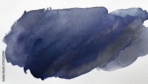 dark blue watercolor stain on a white background photo