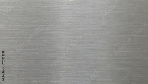 silver metal texture of brushed stainless steel plate with the reflection of light