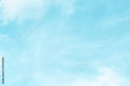 Blue pastel sky with white fluffy cloud. Cumulus clouds background. Cloudscape morning sky. The concepts of freedom of life, never give up and positive though energy. 