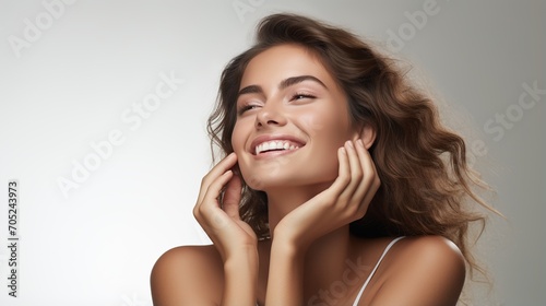 Wallpaper Mural Portrait of a beautiful young woman with brown hair and white teeth smiling Torontodigital.ca